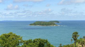 Beautiful Island over blue sea, Blue sky . Summer vacation concept photo