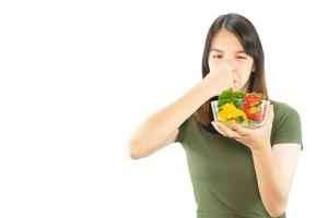 Happy lady holding kichen stuff over copy space background - people home made food preparation concept photo