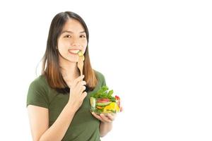 Happy lady holding kichen stuff over copy space background - people home made food preparation concept photo