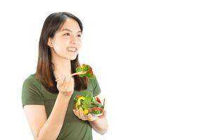 Happy lady holding kichen stuff over copy space background - people home made food preparation concept photo