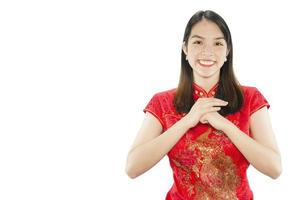 Happy Asian lady in Chinese suite isolated over white copy space - woman day concept photo