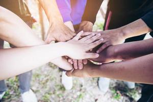 Man touching - holding hand together for success commitment work concept photo