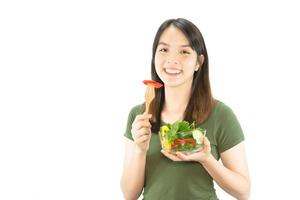 Happy lady holding kichen stuff over copy space background - people home made food preparation concept photo