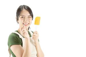 Happy lady holding kichen stuff over copy space background - people home made food preparation concept photo