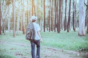 People portrait in green forest nature with warm sun light photo