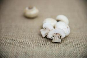 Fresh champignon mushroom vegetable in the kitchen - fresh mushroom vegetable cooking concept photo