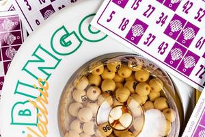 Electronic bingo game with cards to play. Horizontal image viewed from above. photo
