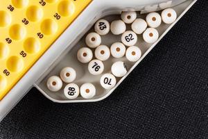 Electronic bingo game with balls to play. Horizontal image viewed from above. photo