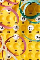 Bingo game with serpentines. Vertical image viewed from above. photo