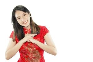 Happy Asian lady in Chinese suite isolated over white copy space - woman day concept photo