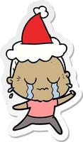 sticker cartoon of a crying old lady wearing santa hat vector