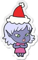 pretty sticker cartoon of a elf girl wearing santa hat vector