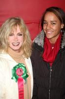 LOS ANGELES, NOV 28 -  Donna Mills, daughter Chloe arrives at the 2010 Hollywood Christmas Parade at Hollywood Boulevard on November 28, 2010 in Los Angeles, CA photo