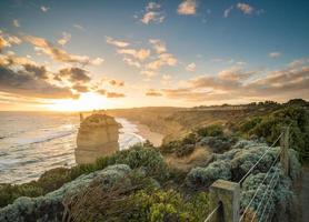 Twelve Apostle the iconic rock formation during the sunset at the Great Ocean Road of Victoria state Australia. photo