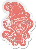 shouting cartoon distressed sticker of a monkey wearing santa hat vector
