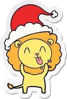 happy sticker cartoon of a lion wearing santa hat vector