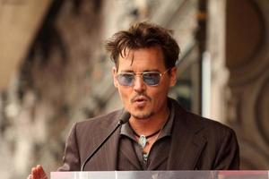 LOS ANGELES, JUN 24 -  Johnny Depp at the Jerry Bruckheimer Star on the Hollywood Walk of Fame at the El Capitan Theater on June 24, 2013 in Los Angeles, CA photo