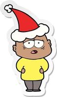 sticker cartoon of a tired bald man wearing santa hat vector