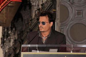 LOS ANGELES, JUN 24 -  Johnny Depp at the Jerry Bruckheimer Star on the Hollywood Walk of Fame at the El Capitan Theater on June 24, 2013 in Los Angeles, CA photo