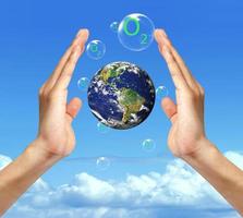 bubbles against the blue sky and clouds. Symbol of environmental protection. photo