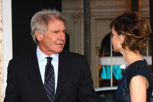 LOS ANGELES, APR 9 -  Harrison Ford, Calista Flockhart arrives at the 42 Premiere at the Chinese Theater on April 9, 2013 in Los Angeles, CA photo