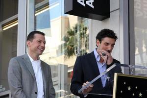 LOS ANGELES, SEP 19 -  Jon Cryer, Chuck Lorre at the Jon Cryer Hollywood Walk of Fame Star Ceremony at Hollywood Walk of Fame on September 19, 2011 in Los Angeles, CA photo