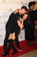 LOS ANGELES, SEP 10 -  Janel Parrish, Valentin Chmerkovskiy at the Dance With Me USA Grand Opening at Dance With Me Studio on September 10, 2014 in Sherman Oaks, CA photo