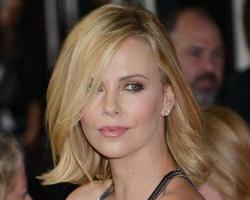 LOS ANGELES, MAR 12 -  Charlize Theron at the The Gunman Premiere at the Regal 14 Theaters on March 12, 2015 in Los Angeles, CA photo