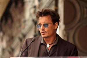 LOS ANGELES, JUN 24 -  Johnny Depp at the Jerry Bruckheimer Star on the Hollywood Walk of Fame at the El Capitan Theater on June 24, 2013 in Los Angeles, CA photo