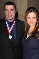 LOS ANGELES, JAN 18 -  John Travolta, Kelly Preston arrives at the Living Legends of Aviation Gala at Beverly Hilton Hotel on January 18, 2013 in Beverly Hills, CA photo