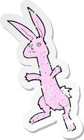 retro distressed sticker of a cartoon rabbit vector