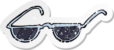 retro distressed sticker of a cartoon sunglasses vector