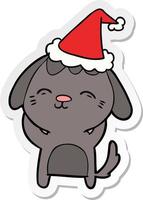 happy sticker cartoon of a dog wearing santa hat vector