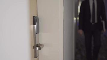 Magnetic door lock. Entering the hotel room by reading a magnetic card. video