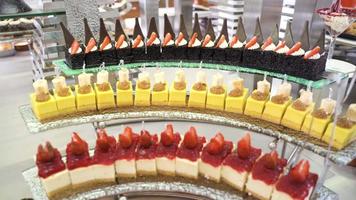 Desserts in the buffet. Buffet desserts in hotel concept. video
