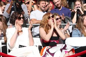 LOS ANGELES, NOV 17 -  Anne Hathaway, Jessica Chastain at the Matthew McConaughey Hollywood Walk of Fame Star Ceremony at the Hollywood and Highland on November 17, 2014 in Los Angeles, CA photo