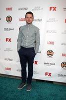 LOS ANGELES, JUN 26 -  Elijah Wood arrives at the FX Summer Comedies Party at Lure on June 26, 2012 in Los Angeles, CA photo