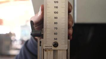 Technician taking measurements, industrial worker. The technician takes millimetric measurements with the tool in his hand. Industry worker. video