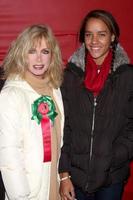 LOS ANGELES, NOV 28 -  Donna Mills, daughter Chloe arrives at the 2010 Hollywood Christmas Parade at Hollywood Boulevard on November 28, 2010 in Los Angeles, CA photo