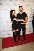LOS ANGELES, SEP 10 -  Janel Parrish, Valentin Chmerkovskiy at the Dance With Me USA Grand Opening at Dance With Me Studio on September 10, 2014 in Sherman Oaks, CA photo
