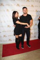 LOS ANGELES, SEP 10 -  Janel Parrish, Valentin Chmerkovskiy at the Dance With Me USA Grand Opening at Dance With Me Studio on September 10, 2014 in Sherman Oaks, CA photo
