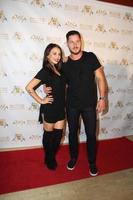 LOS ANGELES, SEP 10 -  Janel Parrish, Val Chmerkovskiy at the Dance With Me USA Grand Opening at Dance With Me Studio on September 10, 2014 in Sherman Oaks, CA photo