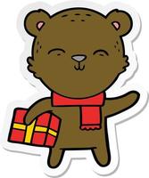 sticker of a happy cartoon bear with present vector