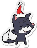 friendly sticker cartoon of a fox wearing santa hat vector