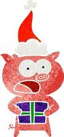 retro cartoon of a pig with christmas present wearing santa hat vector