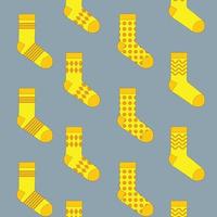 Pattern of vector colorful socks on a gray background