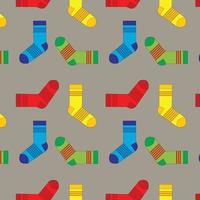 Pattern with socks of different textures and colors. Background of winter fashion items of clothing vector