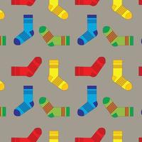 Pattern with socks of different textures and colors. Background of winter fashion items of clothing vector