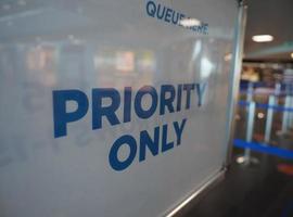 airport priority only queue here sign photo