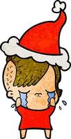textured cartoon of a crying girl wearing santa hat vector